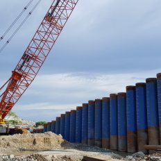 Excavation inside tubular piles using grab hammer